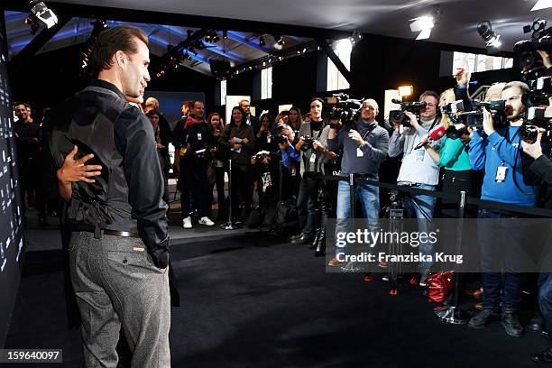 Joseph Fines and Maria Dolores attend the Laurel Autumn/Winter 2013/14 fashion show during Mercedes-Benz Fashion Week Berlin at Brandenburg Gate on...