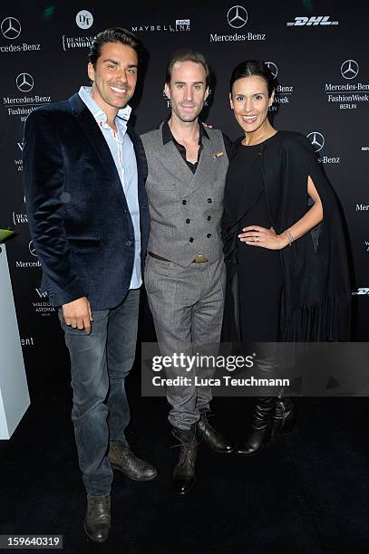 Henner Ceynowa, Joseph Fines and Maria Dolores Dieguez attend the Laurel Autumn/Winter 2013/14 fashion show during Mercedes-Benz Fashion Week Berlin...