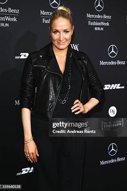 Janine Kunze attends Guido Maria Kretschmer Autumn/Winter 2013/14 fashion show during Mercedes-Benz Fashion Week Berlin at Brandenburg Gate on...