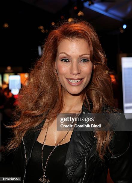 Yasmina Filali leaves after the Guido Maria Kretschmer Autumn/Winter 2013/14 fashion show during Mercedes-Benz Fashion Week Berlin at Brandenburg...