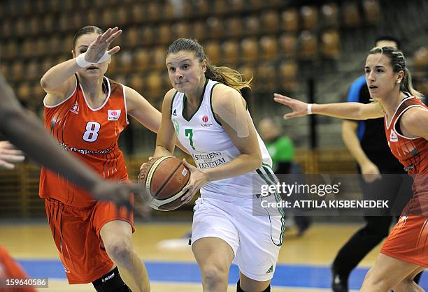 Dora Nagy of Hungarian Hat-Agro UNI Gyoer vies for the ball with Oleksandra Kurasova and Queralt Casas of Spanish Rivas Ecopolis during the Women...