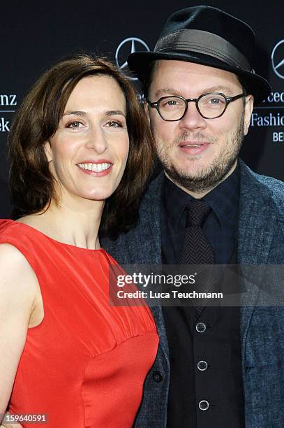 Ulrike Frank and Marc Schubring attend Guido Maria Kretschmer Autumn/Winter 2013/14 fashion show during Mercedes-Benz Fashion Week Berlin at...