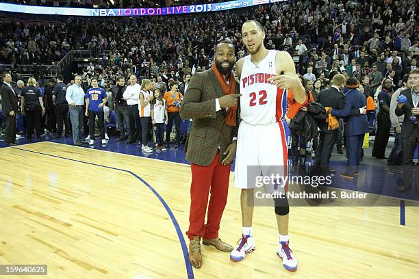 Tayshaun Prince of the Detroit Pistons poses with Baron Davis of the New York Knicks during a game between the New York Knicks and the Detroit...