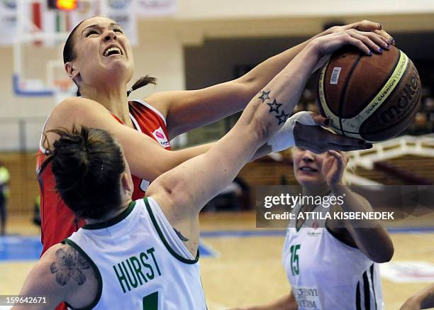 Oleksandra Kurasova of Spanish Rivas Ecopolis vies for the ball with captain Nora Nagy-Bujdoso and Anne Hurst of Hungarian Hat-Agro UNI Gyoer during...