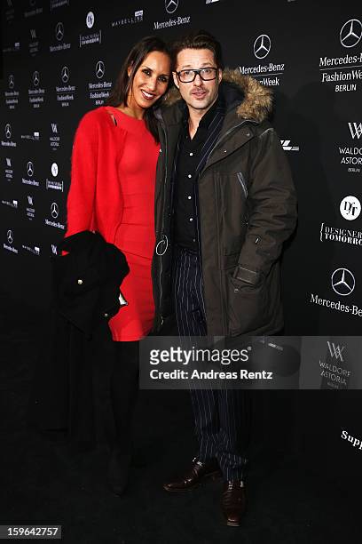 Frederike Dirschel and Bruno Eyron attend Guido Maria Kretschmer Autumn/Winter 2013/14 fashion show during Mercedes-Benz Fashion Week Berlin at...