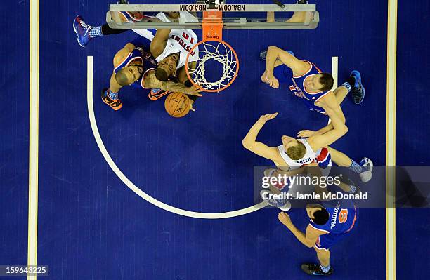 Tyson Chandler of the New York Knicks battles with Greg Monroe of Detroit Pistons during the NBA London Live 2013 game between New York Knicks and...