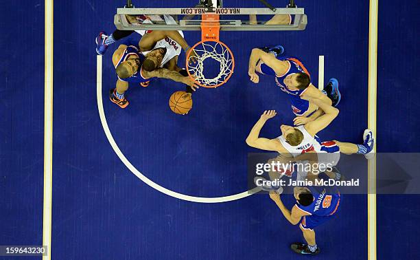 Tyson Chandler of the New York Knicks battles with Greg Monroe of Detroit Pistons during the NBA London Live 2013 game between New York Knicks and...