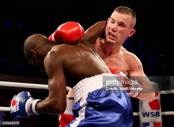 John Joe Nevin of British Lionhearts in action with Daouda Sow of USA Knockouts during their 57-61kg bout in the World Series of Boxing Match between...