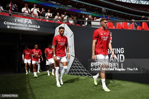 Ben White and Rob Holding of Arsenal enter the pitch to warm up prior to The FA Community Shield match between Manchester City against Arsenal at...