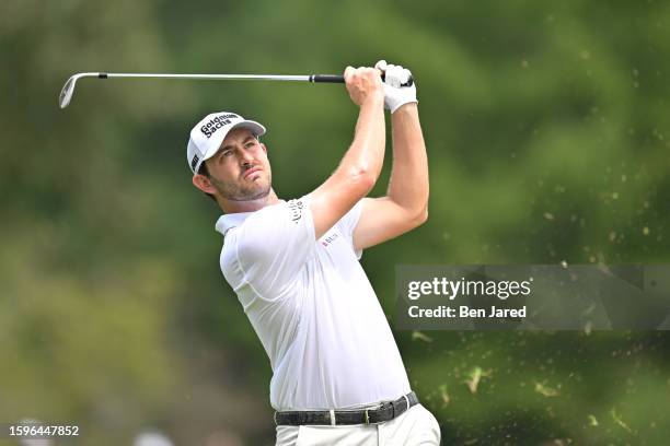 Patrick Cantlay hits a shot on the first fairway during the final round of the FedEx St. Jude Championship at TPC Southwind on August 13, 2023 in...