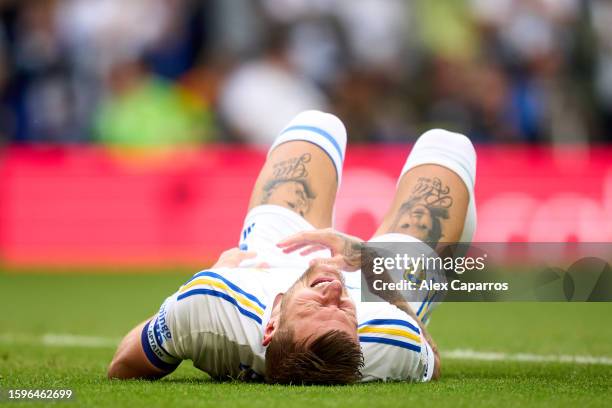 Liam Cooper of Leeds United picks an injury after scoring his team's first goal during the Sky Bet Championship match between Leeds United and...