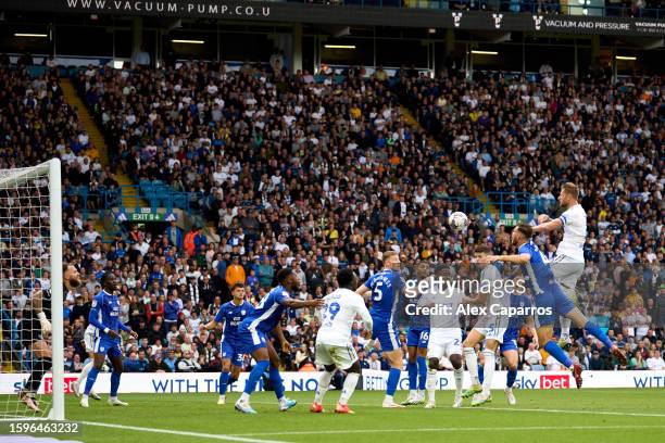 Liam Cooper of Leeds United scores his team's first goal during the Sky Bet Championship match between Leeds United and Cardiff City at Elland Road...
