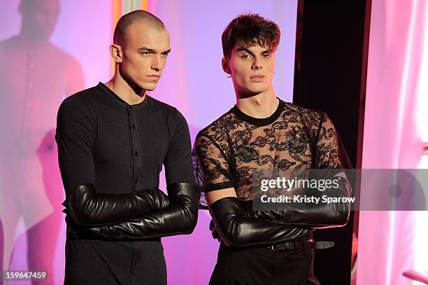 Models pose during the Jean Paul Gaultier Menswear Autumn / Winter 2013/14 show as part of Paris Fashion Week on January 17, 2013 in Paris, France.