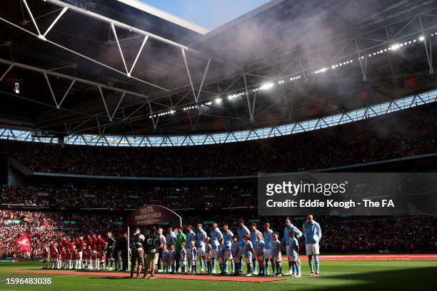 Arsenal and Manchester City line up prior to The FA Community Shield match between Manchester City against Arsenal at Wembley Stadium on August 06,...