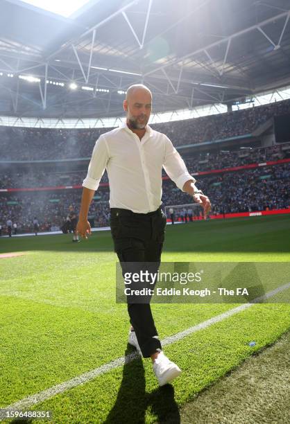 Pep Guardiola, Manager of Manchester City inspects the pitch prior to The FA Community Shield match between Manchester City against Arsenal at...