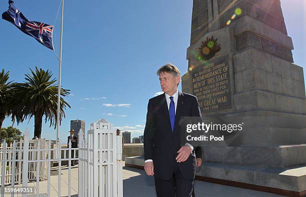 British Defence Minister Philip Hammond leaves after laying a wreath at Kings Park War Memorial before the commencement of the Australia-UK...