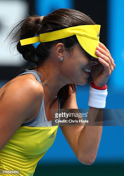 Ana Ivanovic of Serbia reacts on match point in her third round match against Jelena Jankovic of Serbia during day five of the 2013 Australian Open...
