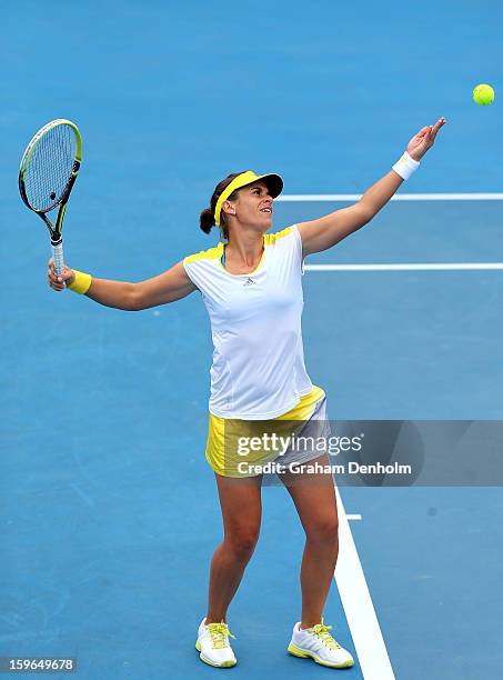 Anabel Medina Garrigues of Spain serves in her mixed doubles first round match with Bruno Soares of Brazil against Bojana Bobusic of Australia and...