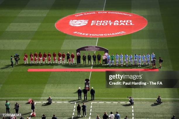 The players of Arsenal and Manchester City line up ahead of The FA Community Shield match between Manchester City against Arsenal at Wembley Stadium...