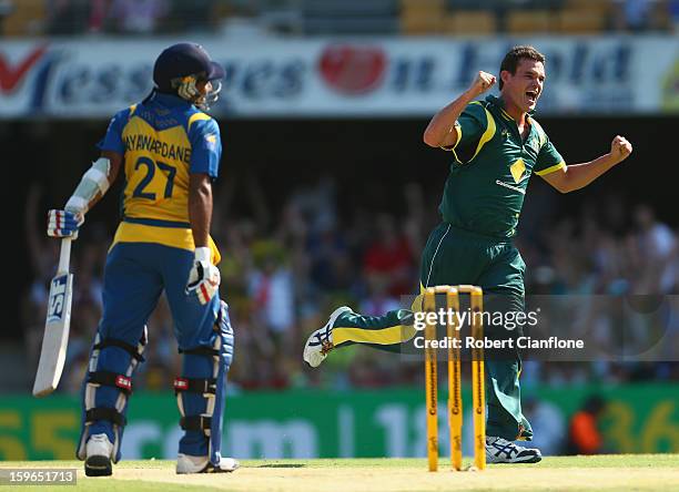 Clint McKay of Australia celebrates taking the wicket of Mahela Jayawardene of Sri Lanka during game three of the Commonwealth Bank One Day...