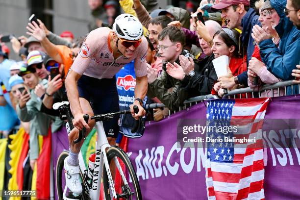 Mathieu Van Der Poel of The Netherlands competes in the breakaway injured after crashes during the 96th UCI Cycling World Championships Glasgow 2023,...