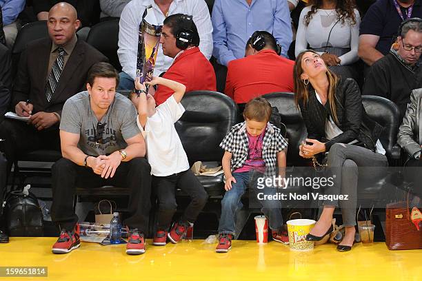 Mark Wahlberg, Michael Wahlberg, Brendan Wahlberg and Rhea Durham attend a basketball game between the Miami Heat and the Los Angeles Lakers at...