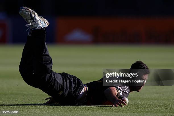 Theo Doropoulos of Wellington fields during the HRV Cup Twenty20 Preliminary Final between the Wellington Firebirds and the Auckland Aces at Basin...