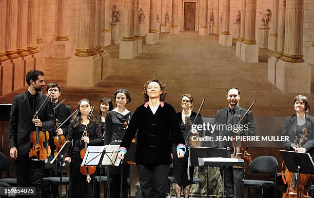 French contralto Nathalie Stutzmann surrounded by her "Orfeo 55" band greets the audience, on January 15 at the Bordeaux Opera, southwestern France,...