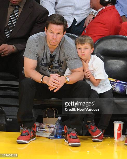 Mark Wahlberg and his son Michael Wahlberg attend a basketball game between the Miami Heat and the Los Angeles Lakers at Staples Center on January...