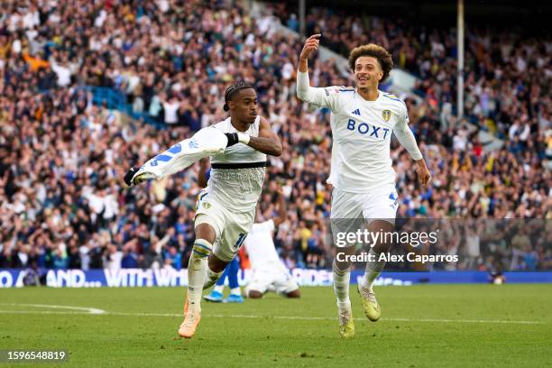 Crysencio Summerville of Leeds United celebrates with his teammate Ethan Ampadu after scoring his team's second goal during the Sky Bet Championship...