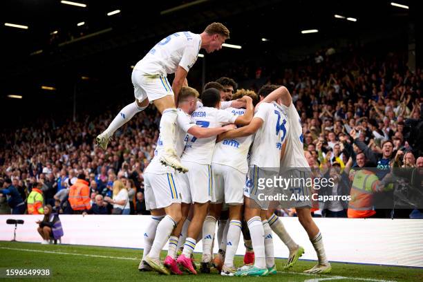 Crysencio Summerville of Leeds United celebrates with teammates after scoring his team's second goal during the Sky Bet Championship match between...