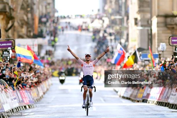 Mathieu Van Der Poel of The Netherlands celebrates at finish line as gold medal winner during the 96th UCI Cycling World Championships Glasgow 2023,...