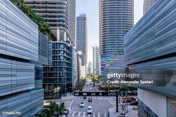 high angle view of street with modern futuristic skyscrapers in miami downtown financial district, florida, usa - miami florida stock pictures, royalty-free photos & images