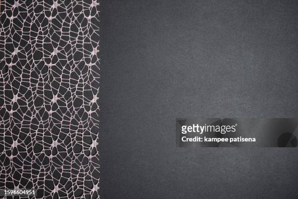 elegant pink paper lace texture on noir background - fond noir stock-fotos und bilder