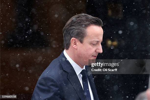 British Prime Minister David Cameron leaves Number 10 Downing Street to travel to the House of Commons to deliver a statement on the unfolding...