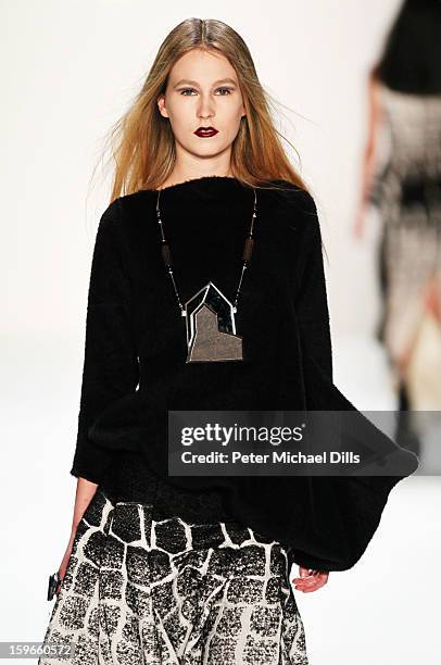 Model walks down the Runway at Irina Schrotter Autumn/Winter 2013/14 fashion show during Mercedes-Benz Fashion Week Berlin at Brandenburg Gate on...