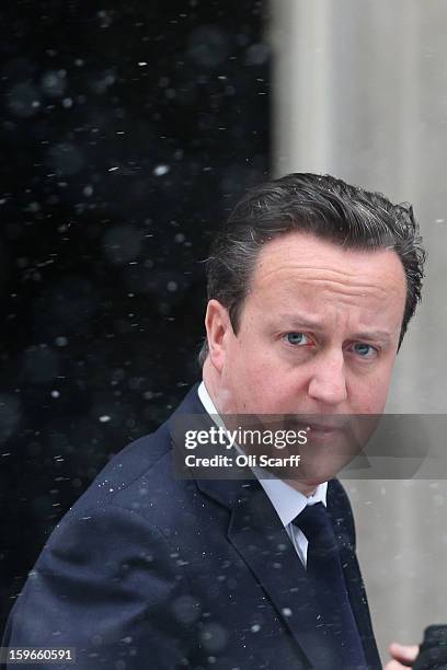 British Prime Minister David Cameron leaves Number 10 Downing Street to travel to the House of Commons to deliver a statement on the unfolding...