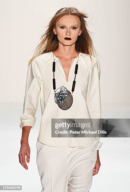 Model walks down the Runway at Irina Schrotter Autumn/Winter 2013/14 fashion show during Mercedes-Benz Fashion Week Berlin at Brandenburg Gate on...