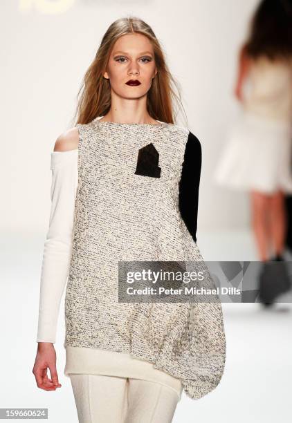 Model walks down the Runway at Irina Schrotter Autumn/Winter 2013/14 fashion show during Mercedes-Benz Fashion Week Berlin at Brandenburg Gate on...