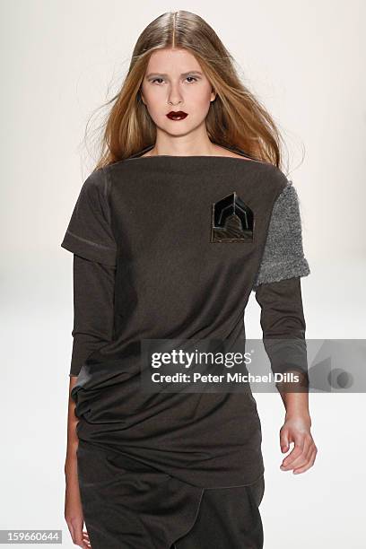 Model walks down the Runway at Irina Schrotter Autumn/Winter 2013/14 fashion show during Mercedes-Benz Fashion Week Berlin at Brandenburg Gate on...