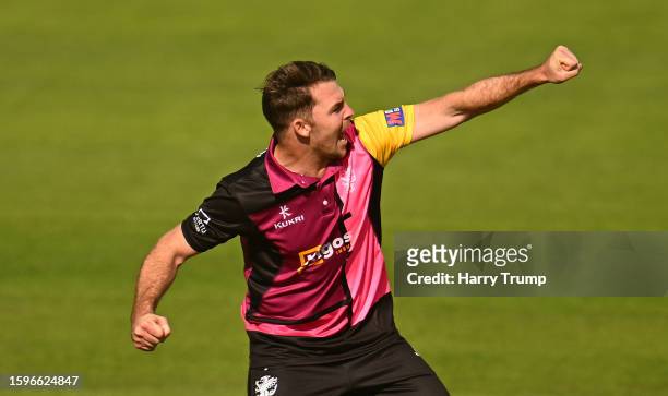 Curtis Campher of Somerset celebrates the wicket of Ben Cox of Worcestershire during the Metro Bank One Day Cup match between Somerset and...