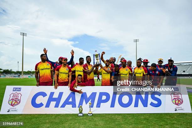 West Indies players celebrate their victory during the fifth and final T20I match between West Indies and India at the Central Broward Regional Park...