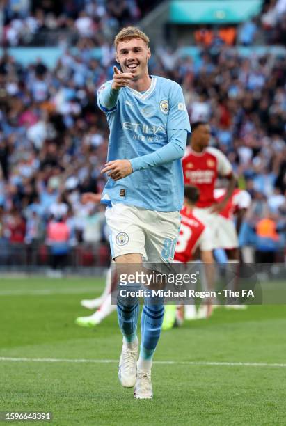 Cole Palmer of Manchester City celebrates after scoring the team's first goal during The FA Community Shield match between Manchester City against...
