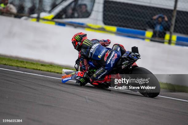 Fabio Quartararo of France and Monster Energy Yamaha MotoGP after he collides with Luca Marini of Italy and Mooney VR46 Racing Team during the race...
