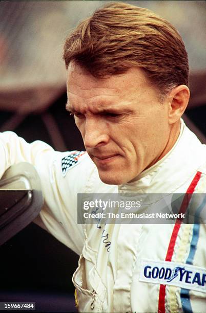 Monterey Grand Prix - Laguna Seca - Can-Am. AAR founder and driver Dan Gurney stands by the paddock. Gurney would qualify his his Chevrolet powered...