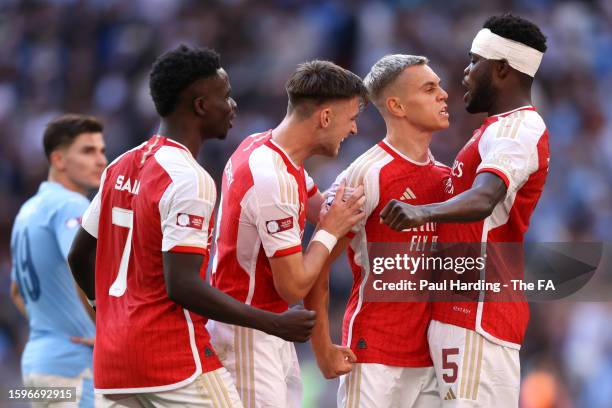 Leandro Trossard of Arsenal celebrates after scoring the team's first goal to equalise with Bukayo Saka, Kieran Tierney and Thomas Partey of Arsenal...