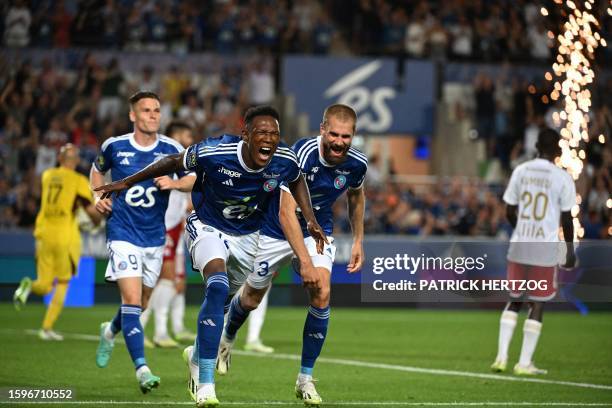 Strasbourg's South African forward Lebo Mothiba celebrates with Strasbourg's French forward Kevin Gameiro and Strasbourg's French defender Thomas...