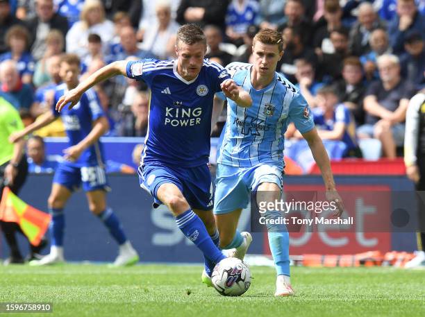 Jamie Vardy of Leicester City is challenged by Ben Sheaf of Coventry City during the Sky Bet Championship match between Leicester City and Coventry...