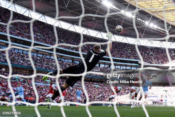 Cole Palmer of Manchester City scores the team's first goal during The FA Community Shield match between Manchester City against Arsenal at Wembley...