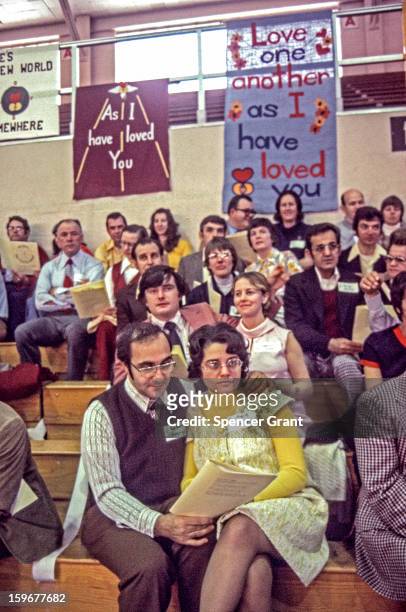 View of couples at 'Marriage Encounter' at Boston College, Chestnut Hill, Massachusetts, 1972.